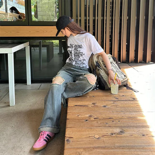 Distressed denim pants
