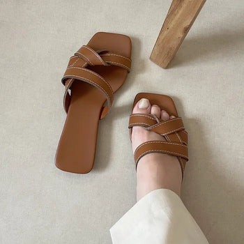 Twist mule sandals