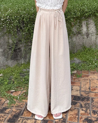 Two-button strap slacks