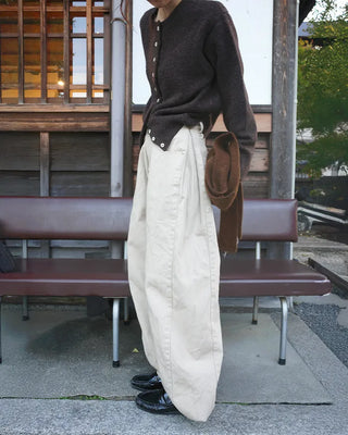 Side-tucked white cotton pants
