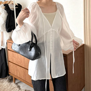 Deep V-neck sheer blouse