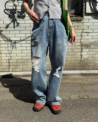 Distressed wide-leg denim pants