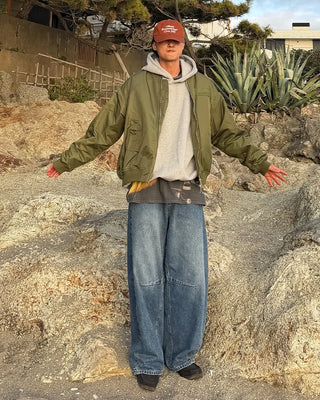 Pointed denim pants with contrasting panels