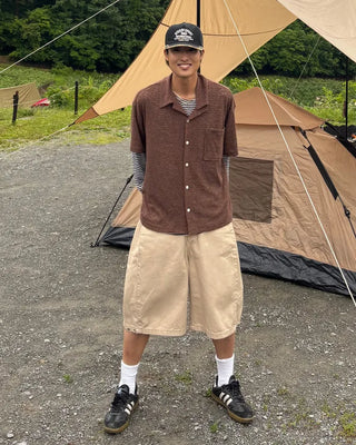 Bermuda shorts with side pleats