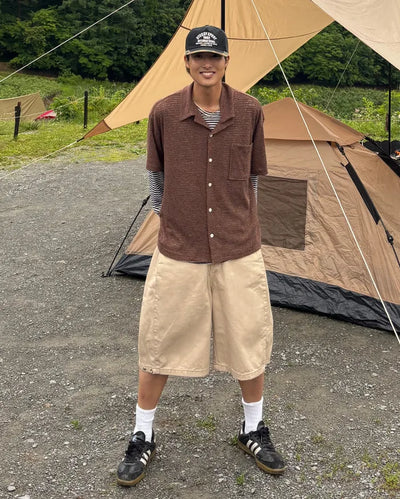 Bermuda shorts with side pleats