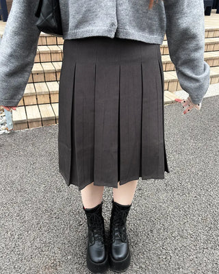 Belted pleated midi skirt