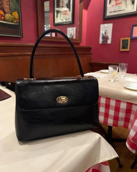 One-button leather handbag