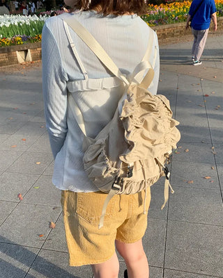 Shirring flap backpack