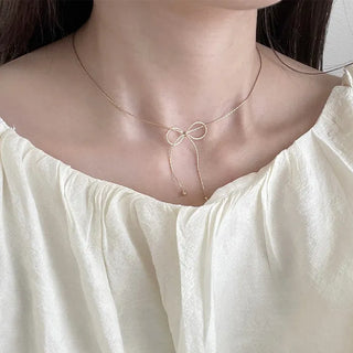 Ribbon motif necklace