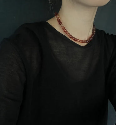 Clear brown ball necklace