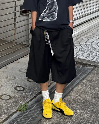 Double-pleated Bermuda shorts