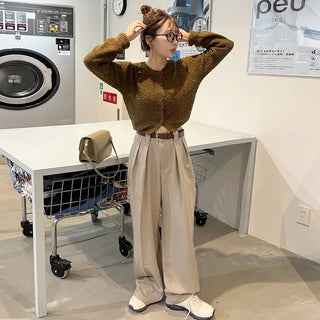 Belted pleated slacks