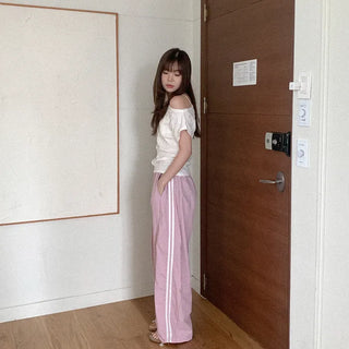 Nylon track pants with elastic waistband