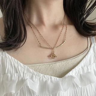 Round motif toggle clasp necklace