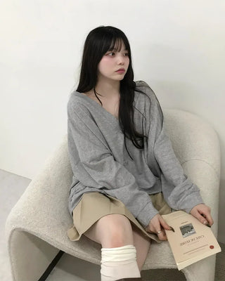 Three-button oversized cardigan