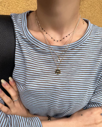 Medal layered necklace