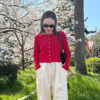 Round punching cardigan