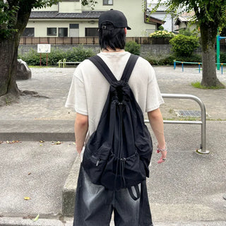 Multi-pocket string backpack
