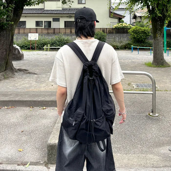 Multi-pocket string backpack