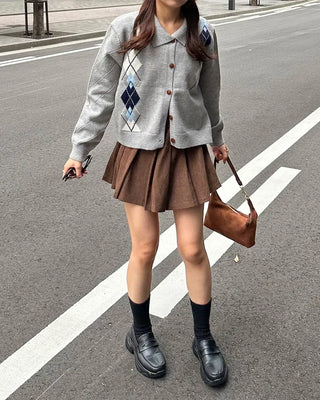 Belted corduroy pleated mini skirt