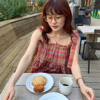 Checked sleeveless blouse