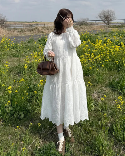 Long dress with neck lace detail and ruffles