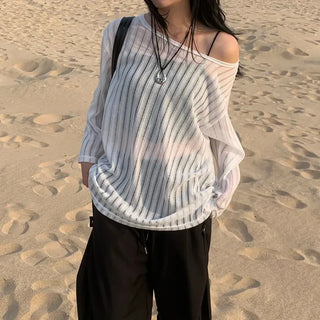 Loose, sheer beach knit