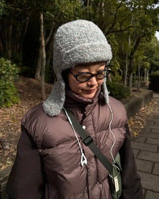 Knit hat with button ear flaps