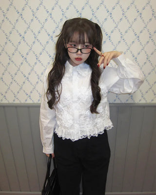 Flower embroidered peplum blouse
