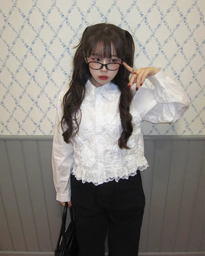 Flower embroidered peplum blouse