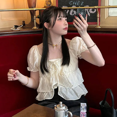 Tiered puff-sleeve blouse