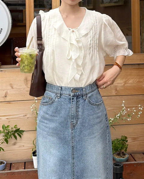Pintuck ruffle bow tie blouse