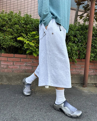 Side-button sweat Bermuda shorts