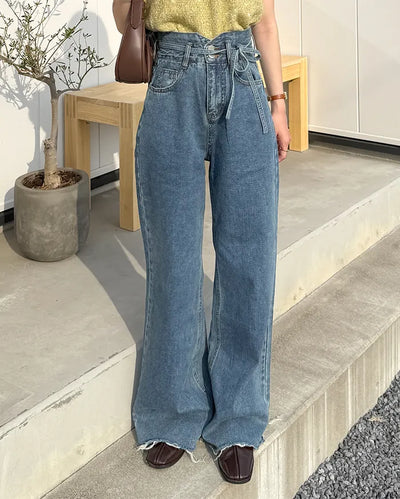 Strap high-waisted denim pants