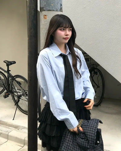 Tie-set loose-fit shirt blouse