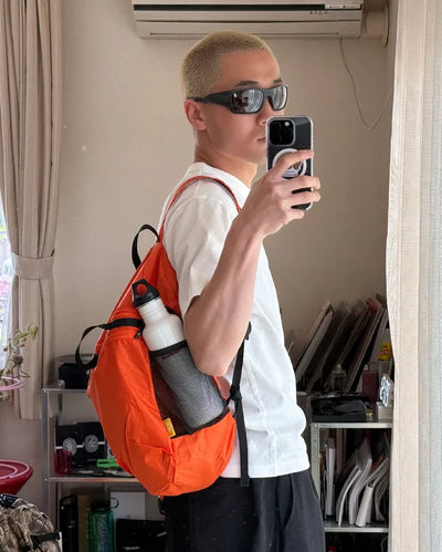 Mesh pocket backpack