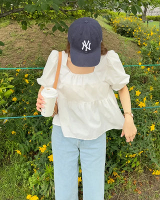 Voluminous peplum blouse