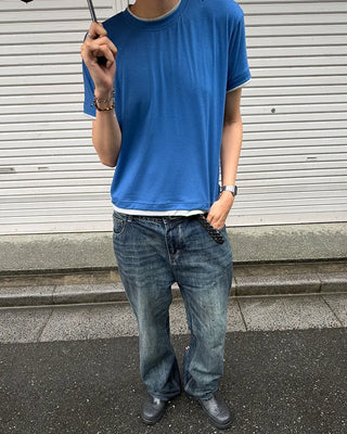 Oil-washed flared denim pants
