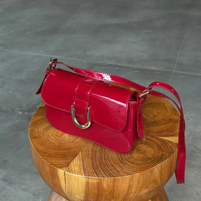 U-buckle shoulder bag