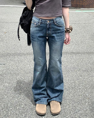 Low-waist point-washed flare jeans