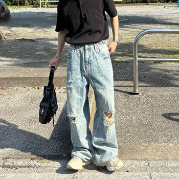 Distressed wide-leg denim pants