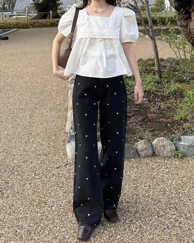 Heart-patterned denim pants