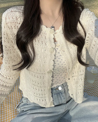 Wave punching cardigan
