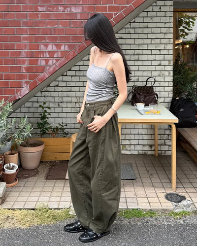 Side-tucked white cotton pants