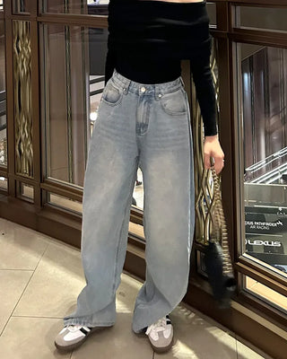 Wide-leg denim with side pleats