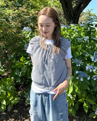 String sleeveless blouse