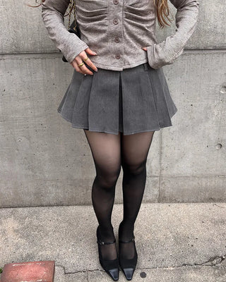 Belted pleated mini skirt