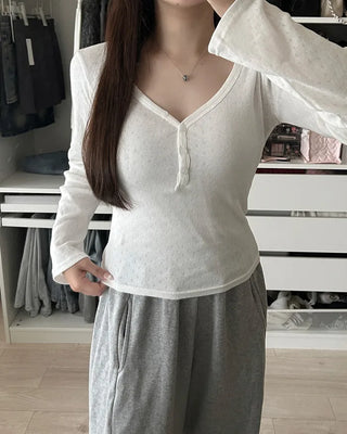 V-neck perforated button long-sleeve shirt