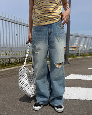 Distressed wide-fit denim pants