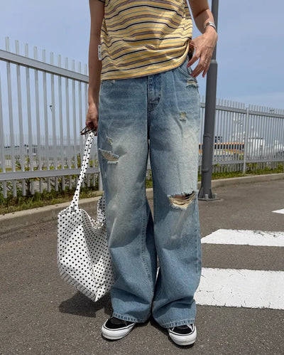 Distressed wide-fit denim pants